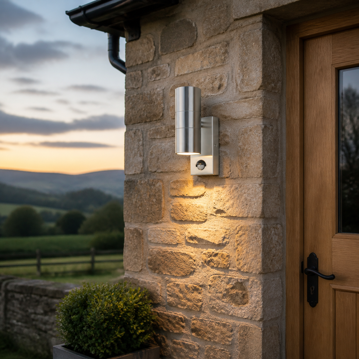 Rural Secure stainless steel PorchGuard PIR Wall Light installed by a rural home entrance