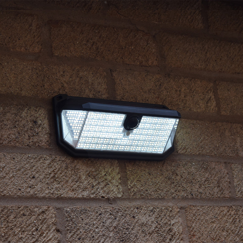 Alerta PIR solar security light illuminated on an exterior wall