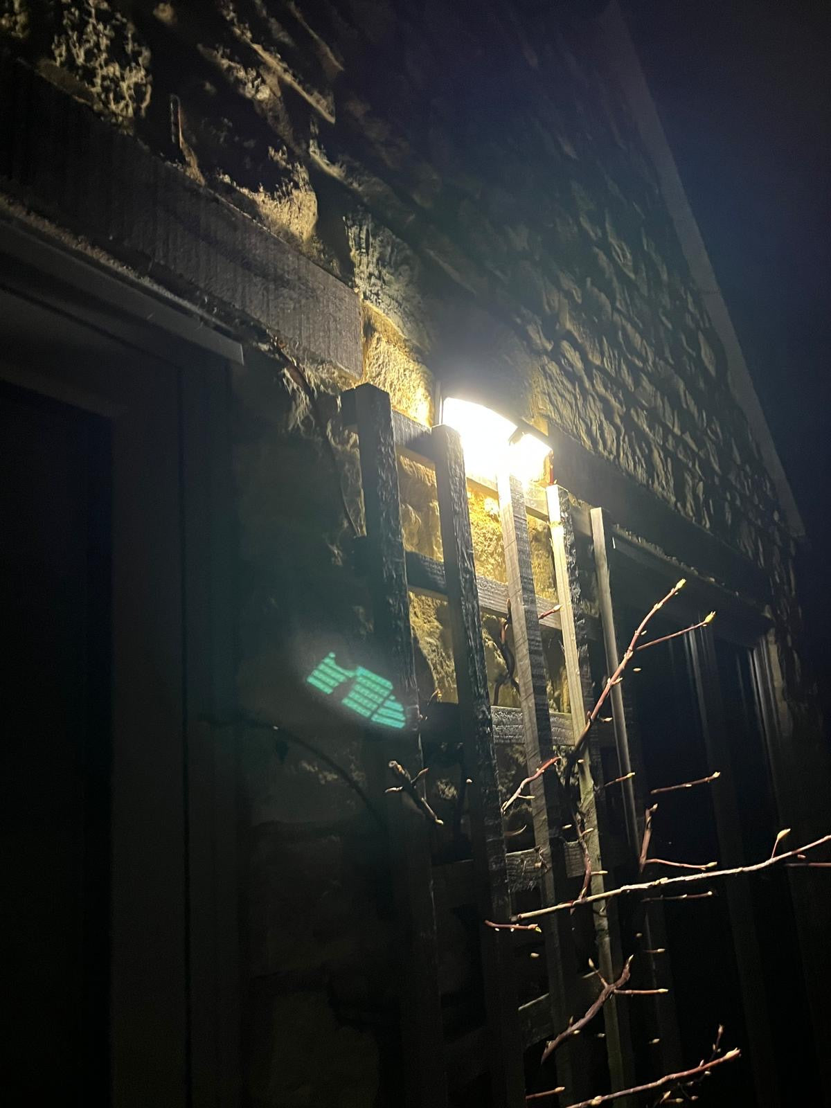 Alerta solar security light installed on a stone rural property