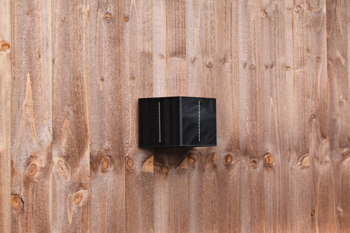Aptrix solar up and down wall light installed in daylight