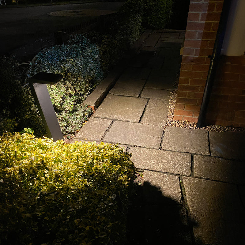 Cresta solar bollard lighting a path at night