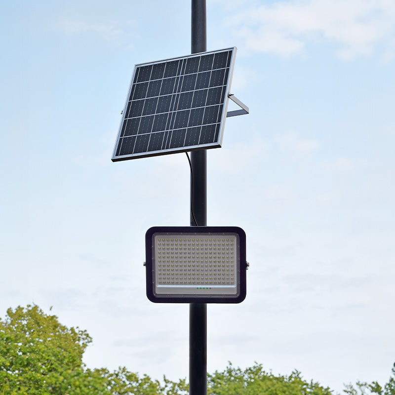Heliosol solar floodlight and panel mounted on a lighting column