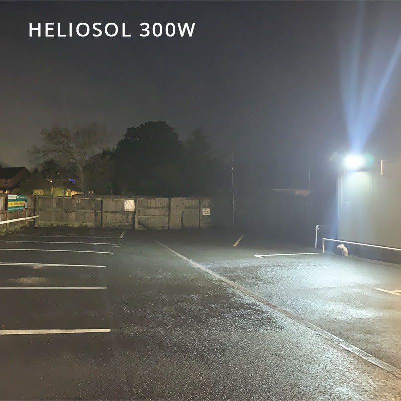 Heliosol 300W solar floodlight illuminating a commercial car park