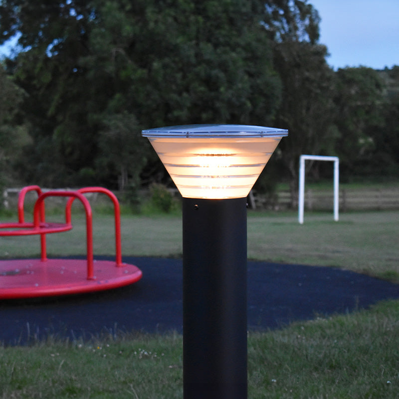 Onyx tamper-resistant solar bollard installed in a playground
